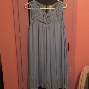 Blue dress with lace detailing.